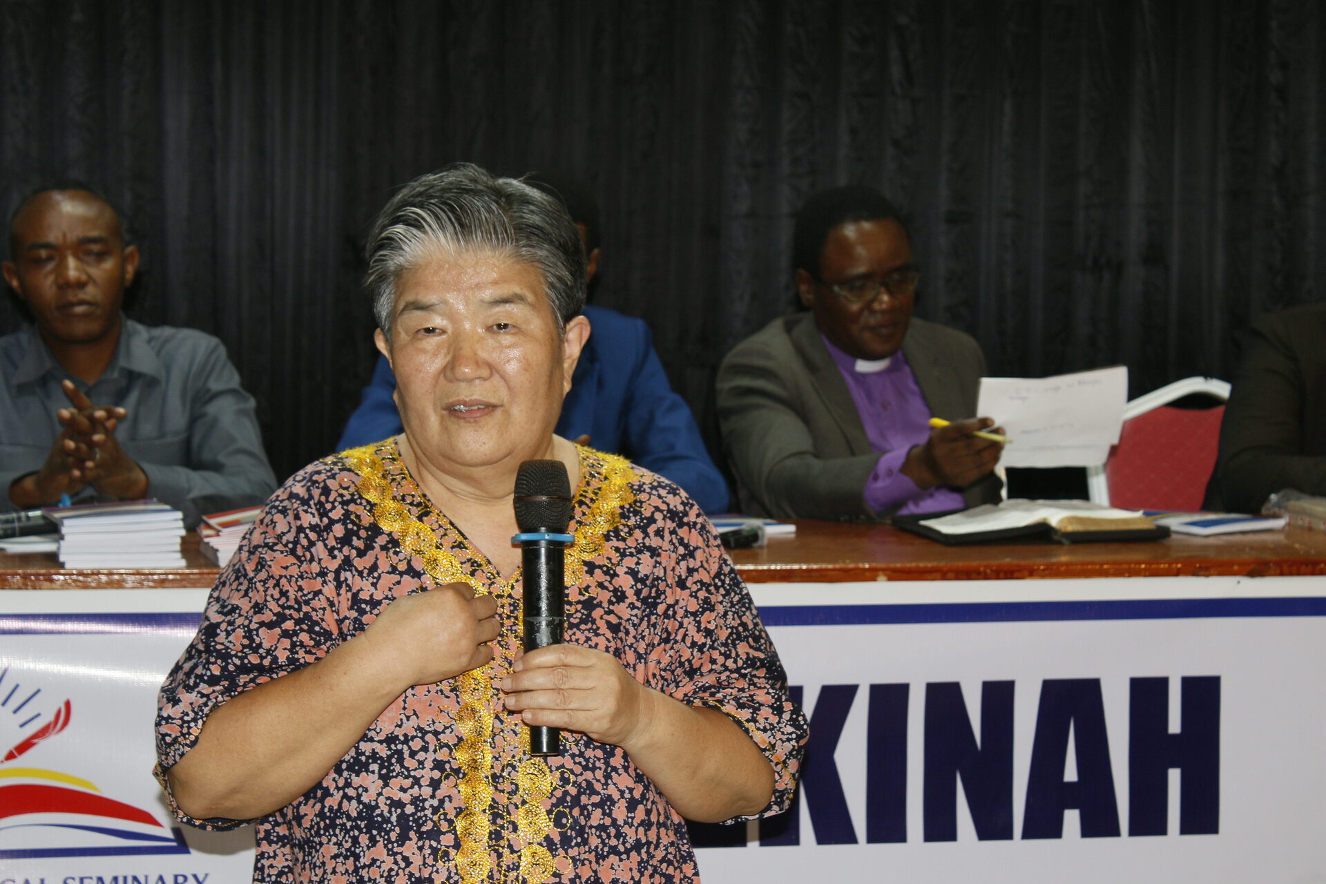 Speaker addressing the STS launch event
